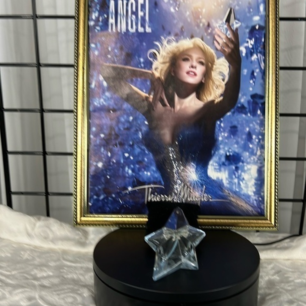 Original Thierry Mugler crystal eau de parfume bottle. Empty. Display only.
